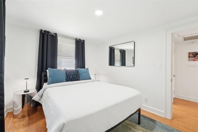 3611 4th Ave N, Saint Petersburg, FL 33713 - bedroom featuring visible vents, baseboards, recessed lighting, and wood finished floors