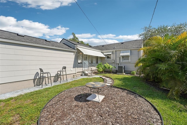 3611 4th Ave N, Saint Petersburg, FL 33713 - view of yard featuring central AC unit and entry steps