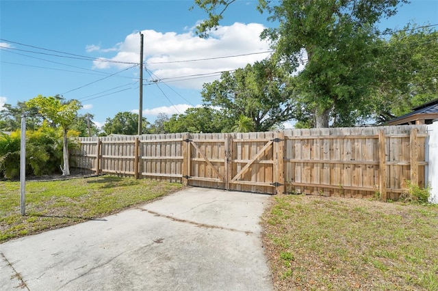 3611 4th Ave N, Saint Petersburg, FL 33713 - view of gate featuring a yard and fence