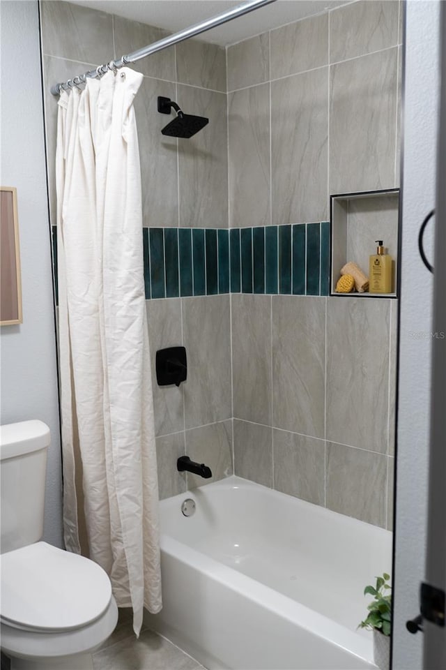 full bathroom with toilet and shower / bath combination with curtain