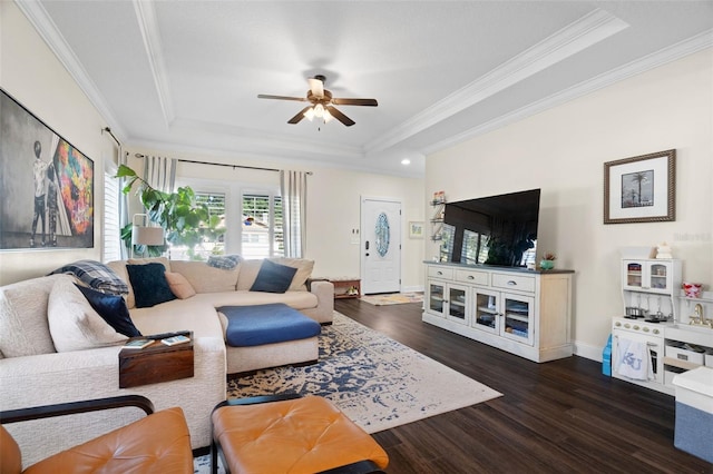 1410 25th St N, Saint Petersburg, FL 33713 - living room with dark wood finished floors, a tray ceiling, a ceiling fan, crown molding, and baseboards
