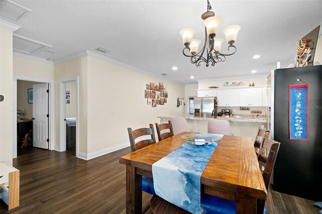 1410 25th St N, Saint Petersburg, FL 33713 - dining room featuring crown molding, an inviting chandelier, baseboards, dark wood-style flooring, and recessed lighting