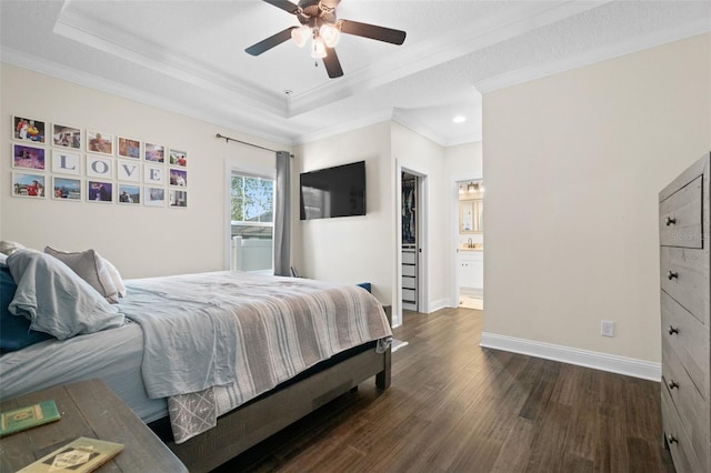 1410 25th St N, Saint Petersburg, FL 33713 - bedroom with dark wood-style floors, a raised ceiling, baseboards, recessed lighting, and ornamental molding