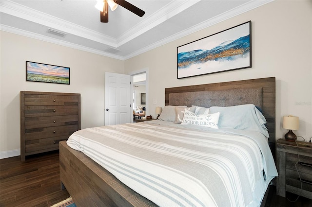 1410 25th St N, Saint Petersburg, FL 33713 - bedroom with ornamental molding, dark wood-style flooring, visible vents, and a raised ceiling