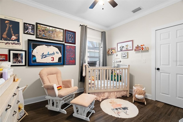 1410 25th St N, Saint Petersburg, FL 33713 - bedroom featuring dark wood finished floors, a crib, visible vents, crown molding, and baseboards