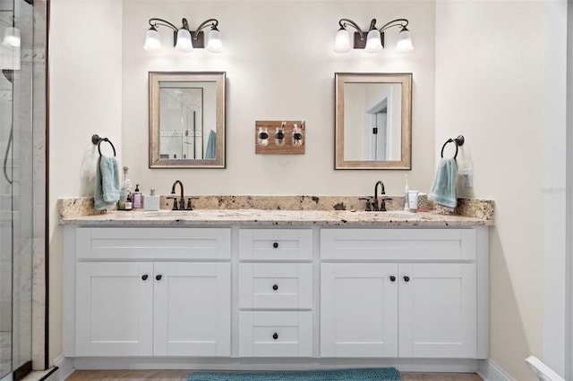 1410 25th St N, Saint Petersburg, FL 33713 - full bath with walk in shower, a sink, and double vanity