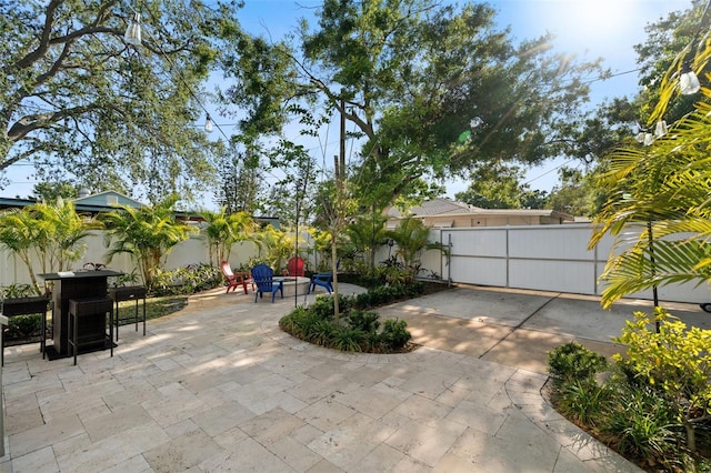 1410 25th St N, Saint Petersburg, FL 33713 - view of patio featuring a fenced backyard