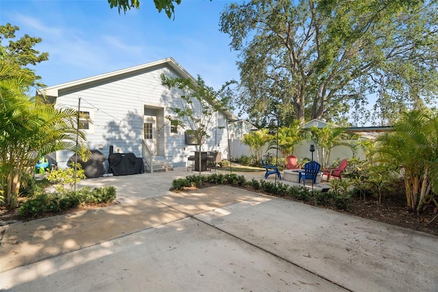 1410 25th St N, Saint Petersburg, FL 33713 - view of side of property featuring a patio area