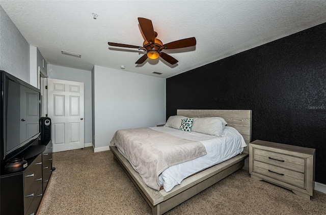 805 100th Ave N, Saint Petersburg, FL 33702 - bedroom featuring visible vents, ceiling fan, light colored carpet, and a textured ceiling