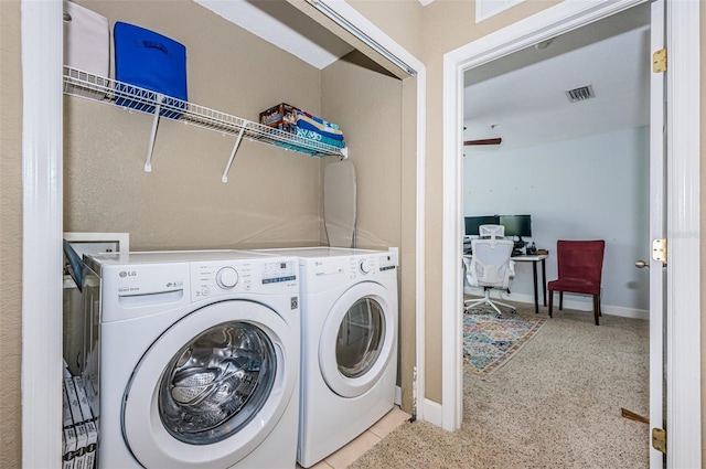 805 100th Ave N, Saint Petersburg, FL 33702 - washroom featuring baseboards, visible vents, washer and clothes dryer, and laundry area
