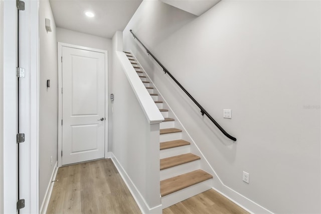 445 31st Way N, Saint Petersburg, FL 33713 - staircase featuring baseboards, recessed lighting, and wood finished floors