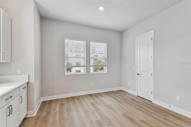 445 31st Way N, Saint Petersburg, FL 33713 - interior space with light wood-style floors, recessed lighting, and baseboards