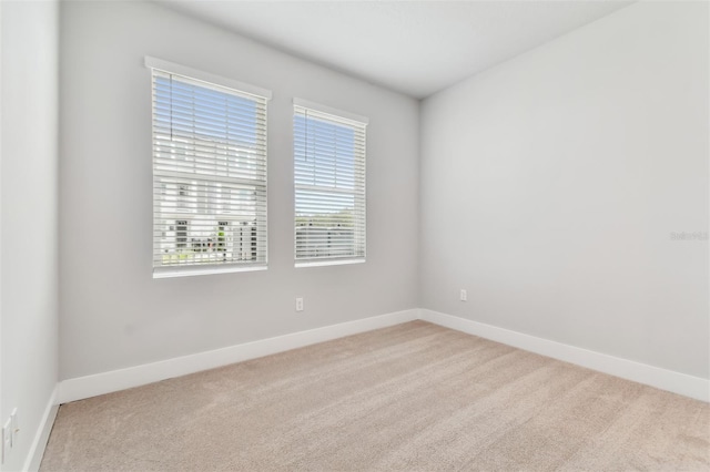 445 31st Way N, Saint Petersburg, FL 33713 - unfurnished room featuring carpet floors and baseboards