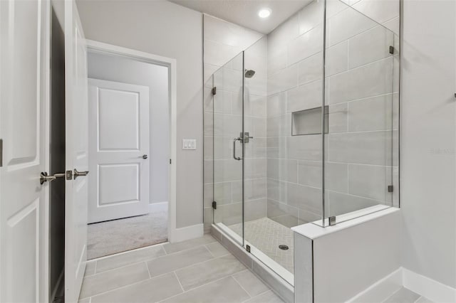 445 31st Way N, Saint Petersburg, FL 33713 - full bath featuring recessed lighting, baseboards, a shower stall, and tile patterned floors