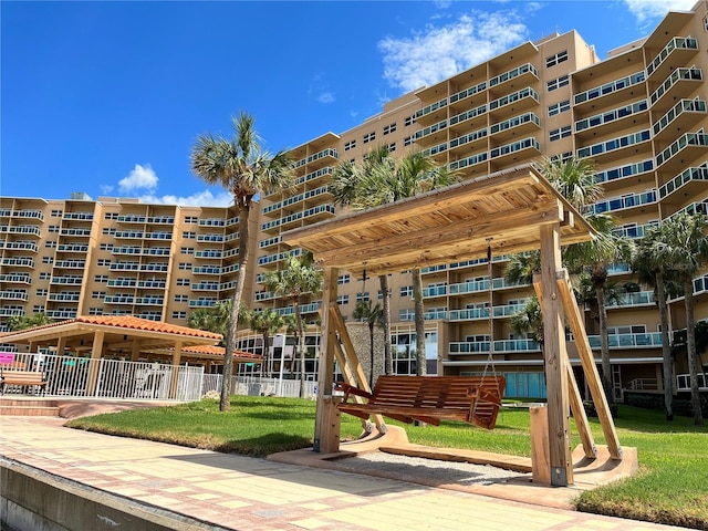view of building exterior with fence