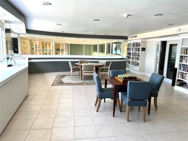 dining space with light tile patterned floors