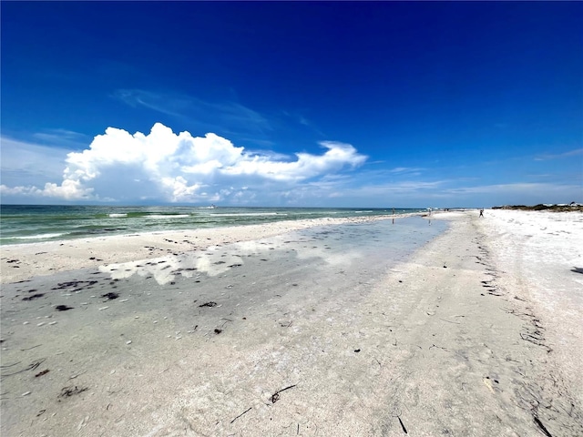 property view of water featuring a beach view