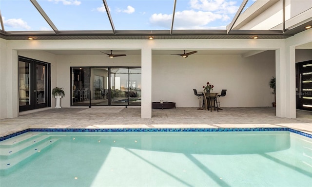 3610 Gulf City Rd, Ruskin, FL 33570 - pool with ceiling fan, glass enclosure, and a patio area