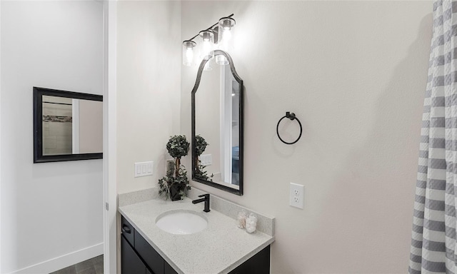 3610 Gulf City Rd, Ruskin, FL 33570 - bathroom featuring vanity and baseboards