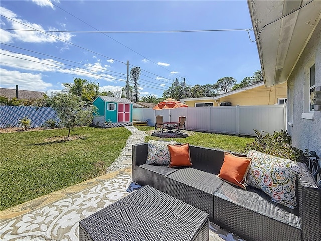 view of patio with an outdoor structure, a storage unit, outdoor lounge area, outdoor dining area, and a fenced backyard
