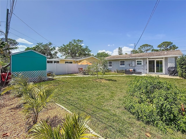 view of yard featuring fence