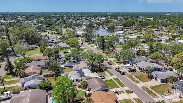 aerial view featuring a water view and a residential view