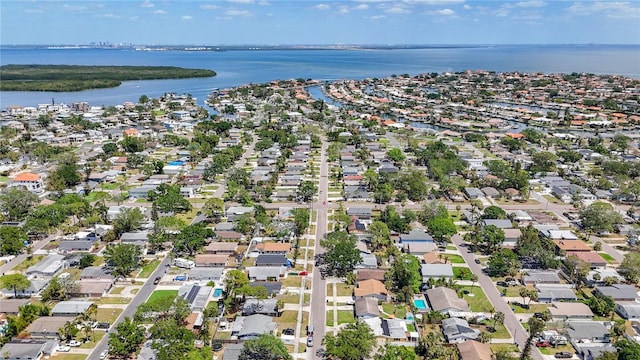 bird's eye view featuring a residential view and a water view