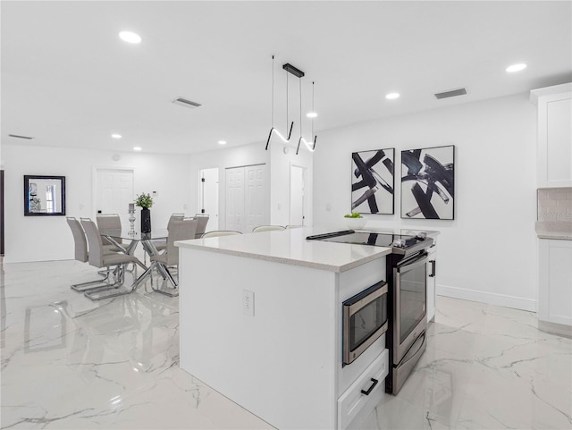 kitchen featuring marble finish floor, stainless steel range with electric cooktop, white cabinetry, and recessed lighting