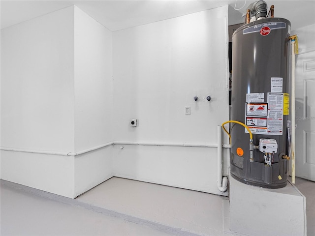 utility room with water heater