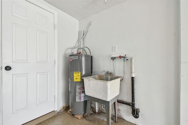 utilities with a sink and electric water heater