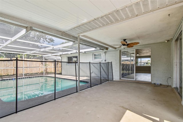 view of swimming pool with a fenced in pool, a patio, and ceiling fan
