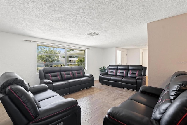 3654 Warbler Dr, New Port Richey, FL 34652 - living room featuring baseboards, visible vents, and a textured ceiling