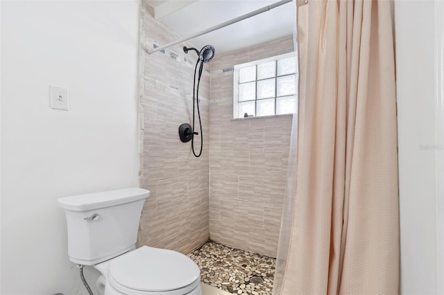 3654 Warbler Dr, New Port Richey, FL 34652 - bathroom with a shower stall and toilet