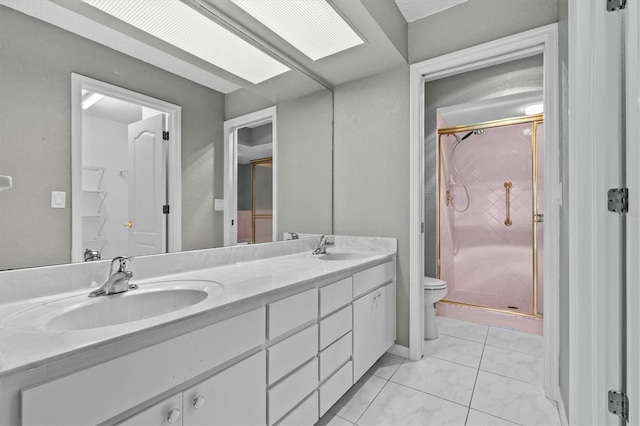 2023 Golfview Dr Unit 2023, Tarpon Springs, FL 34689 - bathroom featuring a shower stall, double vanity, and toilet