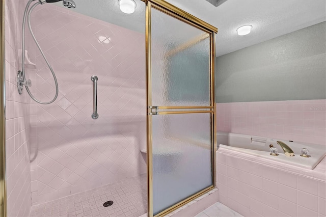 2023 Golfview Dr Unit 2023, Tarpon Springs, FL 34689 - full bathroom with a stall shower, a garden tub, and a textured ceiling