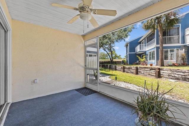 2023 Golfview Dr Unit 2023, Tarpon Springs, FL 34689 - unfurnished sunroom with ceiling fan