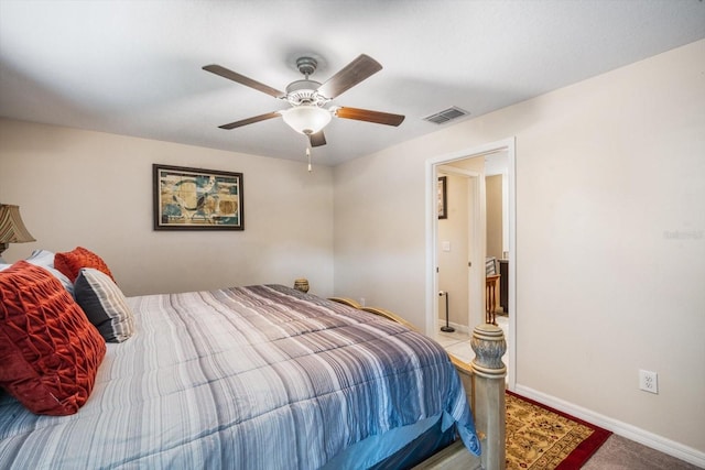 bedroom featuring visible vents, baseboards, and ceiling fan