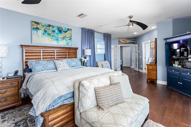 bedroom with recessed lighting, wood finished floors, ceiling fan, baseboards, and visible vents