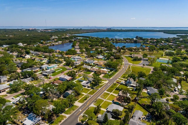 bird's eye view with a water view and a residential view