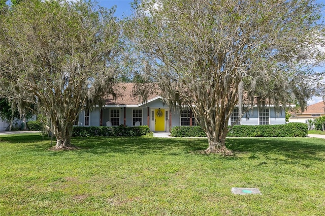 view of front of property with a front lawn