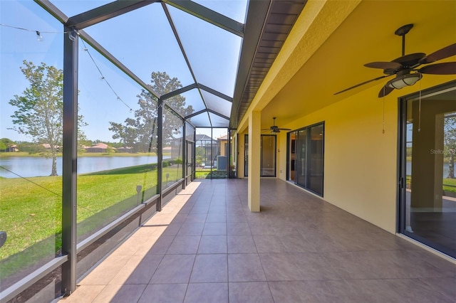 336 Silver Falls Dr, Apollo Beach, FL 33572 - unfurnished sunroom with a healthy amount of sunlight, ceiling fan, and a water view