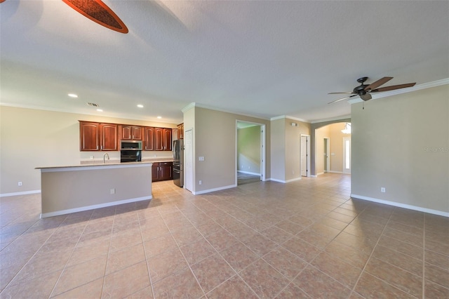 336 Silver Falls Dr, Apollo Beach, FL 33572 - unfurnished living room featuring ornamental molding, ceiling fan, arched walkways, and light tile patterned floors