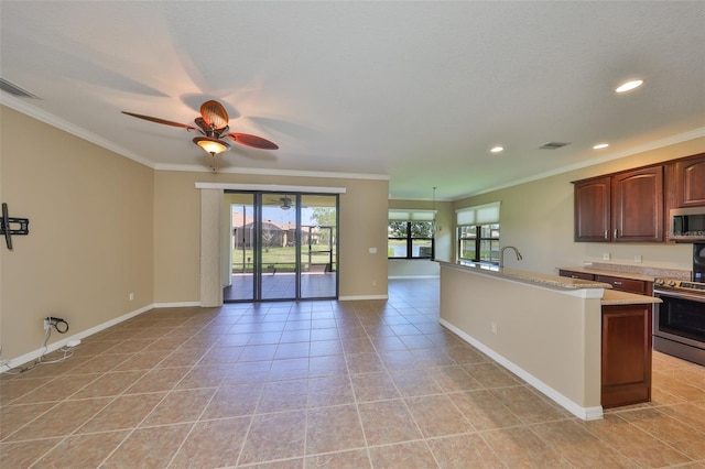 336 Silver Falls Dr, Apollo Beach, FL 33572 - kitchen featuring visible vents, open floor plan, a ceiling fan, crown molding, and stainless steel appliances