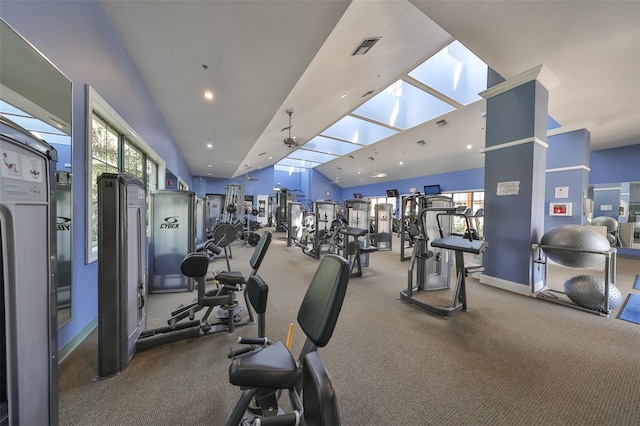 336 Silver Falls Dr, Apollo Beach, FL 33572 - gym featuring visible vents, baseboards, vaulted ceiling with skylight, and carpet floors