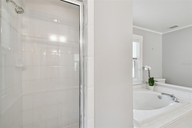 full bathroom featuring a bath, a stall shower, crown molding, and visible vents