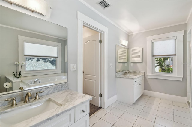 bathroom featuring a sink, visible vents, ornamental molding, and plenty of natural light