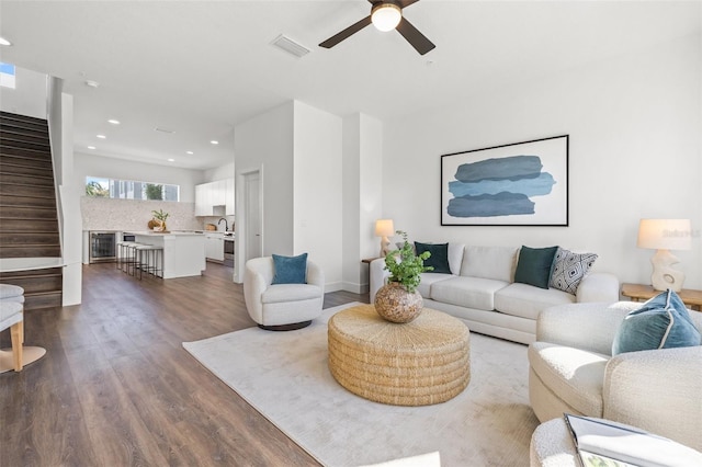 883 6th Ave S, Saint Petersburg, FL 33701 - living area featuring ceiling fan, visible vents, recessed lighting, dark wood-style flooring, and stairs