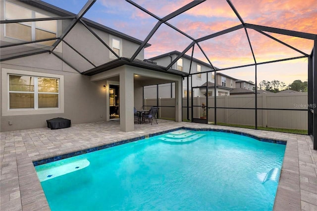 19926 Stone Pine Cir, Lutz, FL 33558 - view of swimming pool with a patio, fence, and glass enclosure
