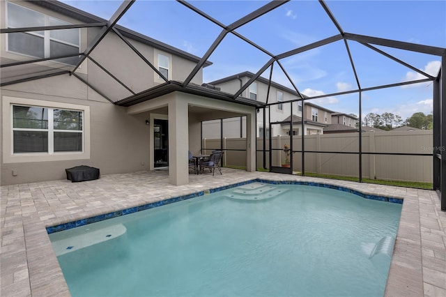 19926 Stone Pine Cir, Lutz, FL 33558 - view of swimming pool featuring a patio, a lanai, and fence
