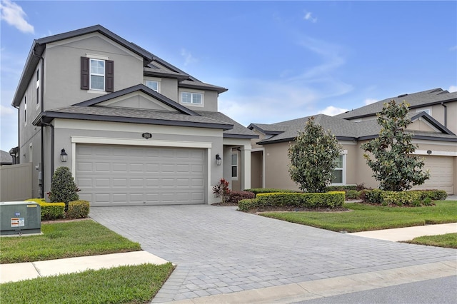 19926 Stone Pine Cir, Lutz, FL 33558 - traditional-style house with decorative driveway, stucco siding, and a front yard